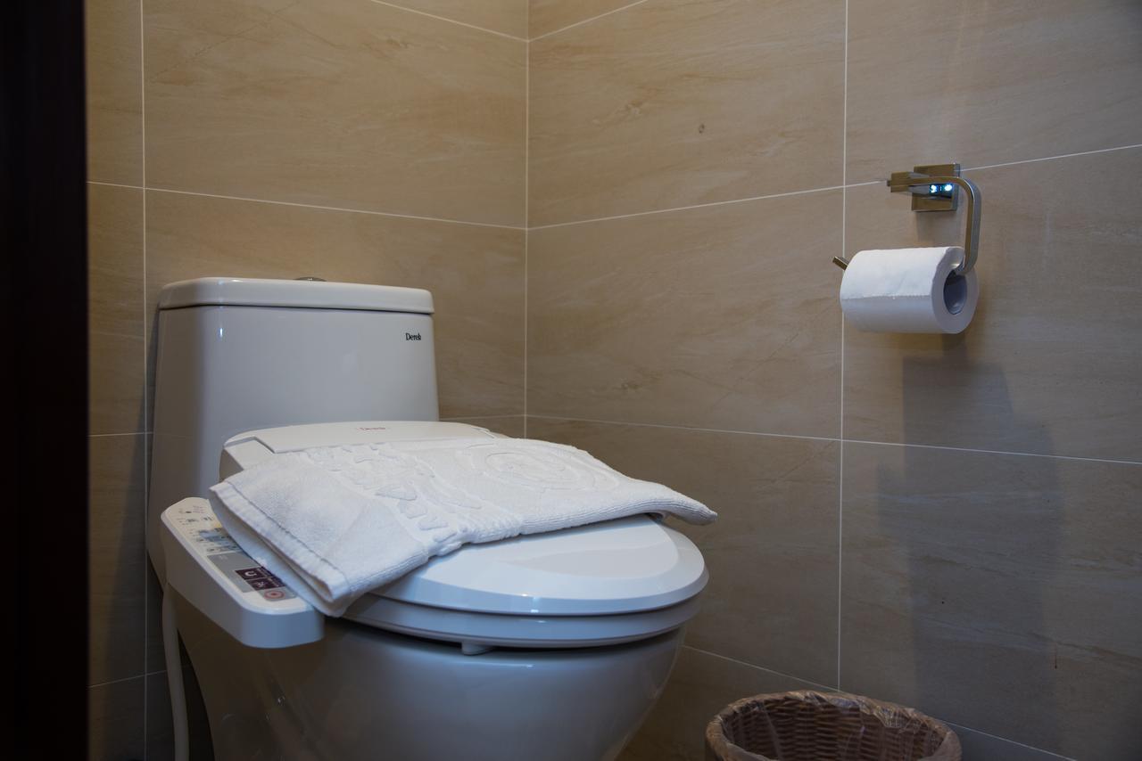 Issmy Hotel Spring Resort Цзяоси Экстерьер фото